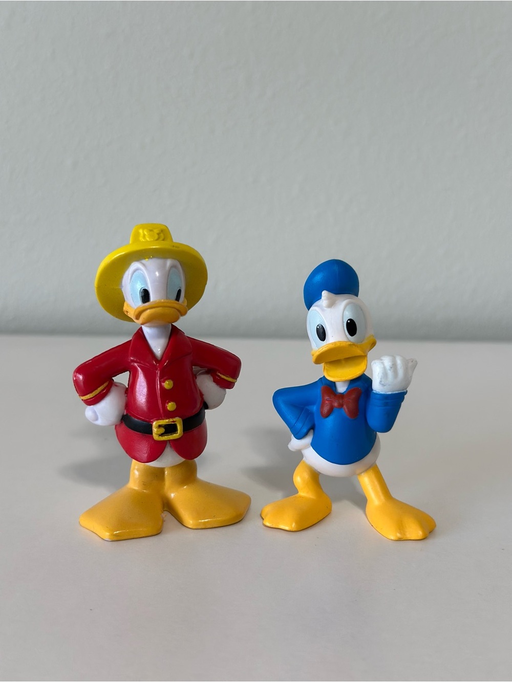 Disney Donald Duck Toy Figures in Blue, Red and Yellow